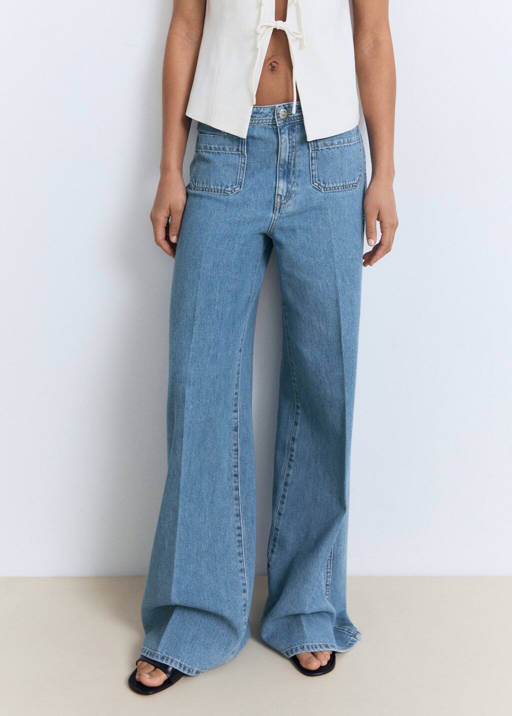 High-rise wide leg jeans with pockets - Women | MANGO Thailand