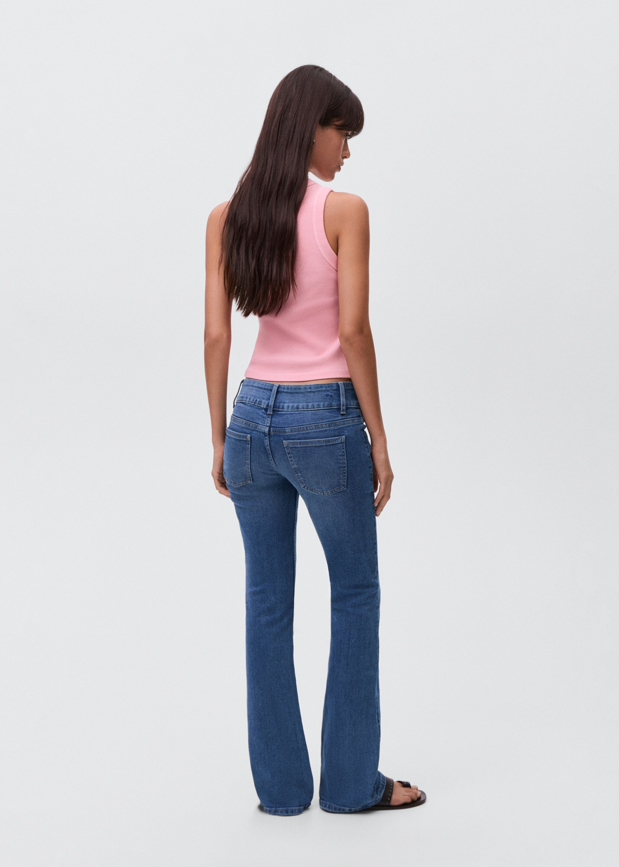 Low-waist flared jeans - Reverse of the article