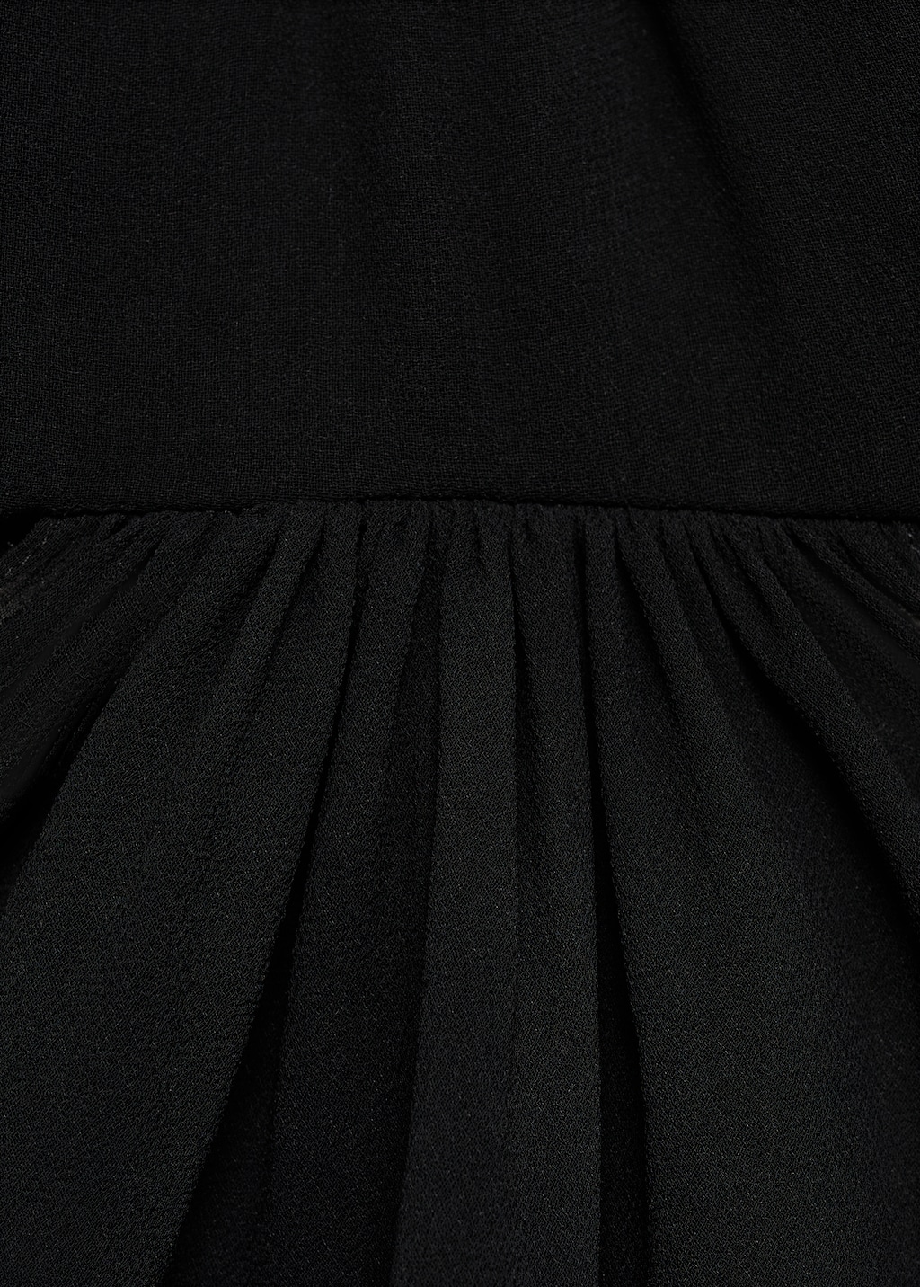 Dress with asymmetrical hem and cut-out