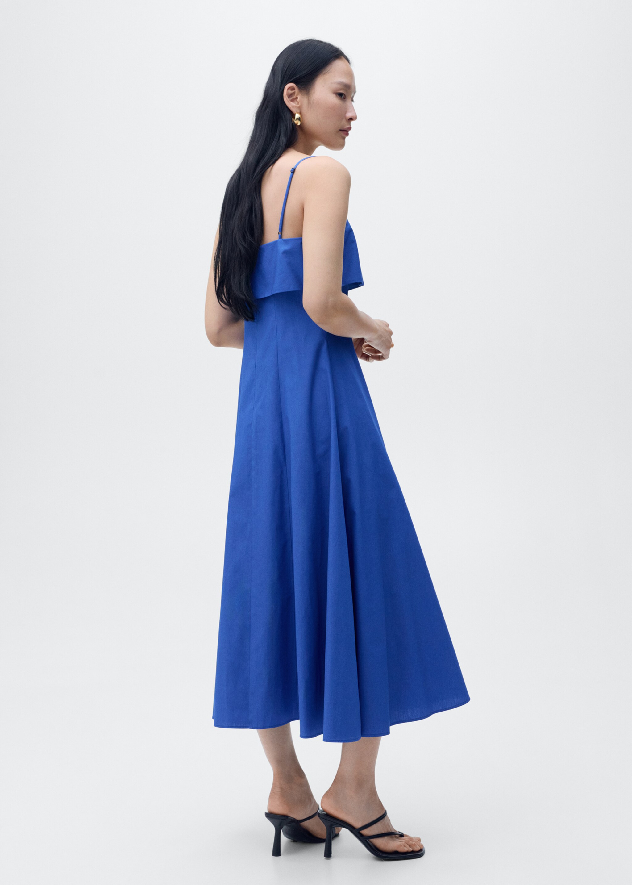 Flared dress with ruffles - Reverse of the article