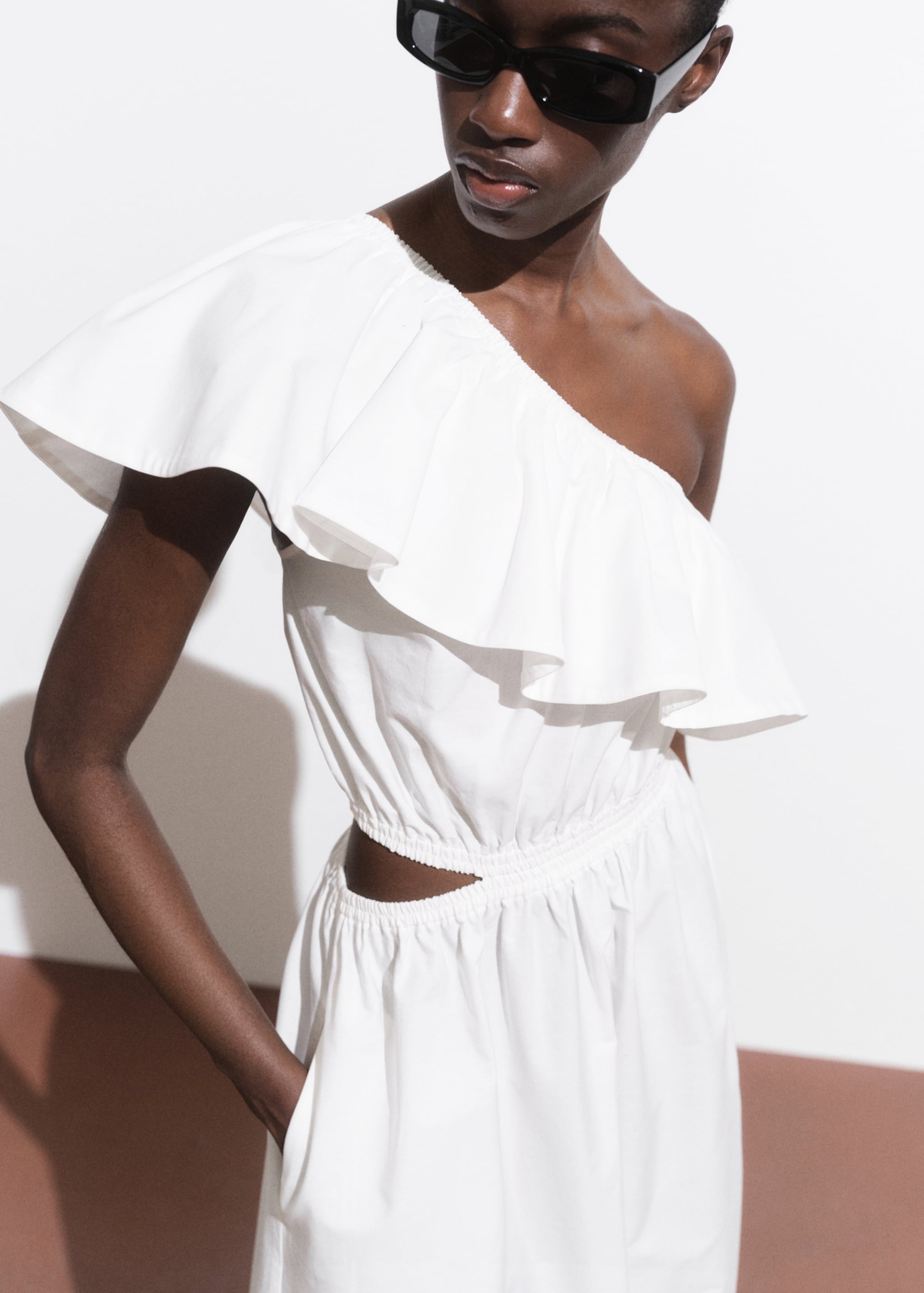 Asymmetrical dress with cut-out - Details of the article 1