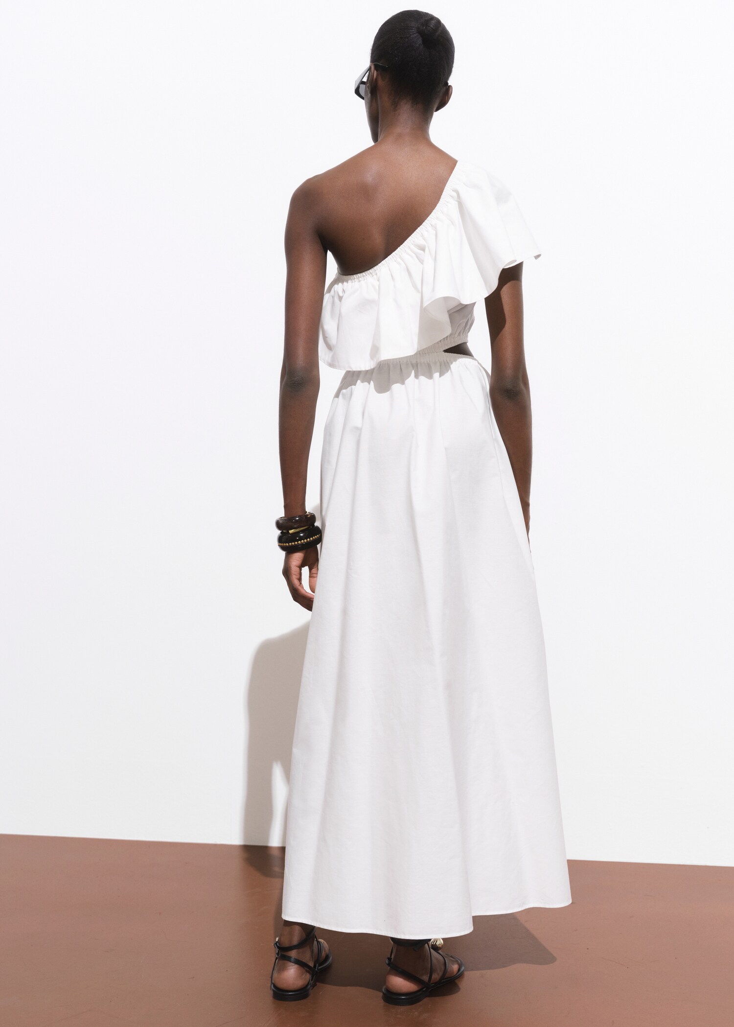 Asymmetrical dress with cut-out - Reverse of the article