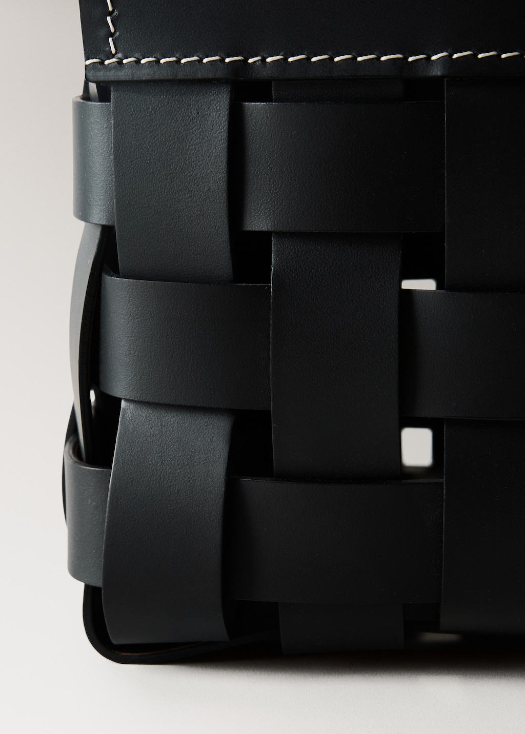 Small braided leather basket