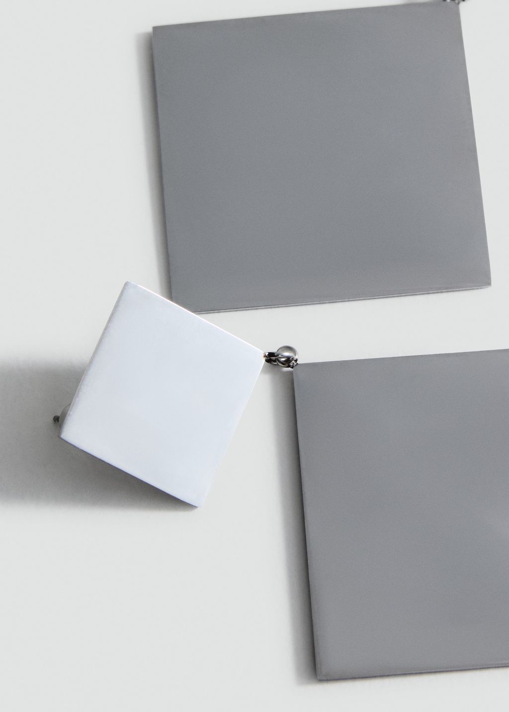 Geometric pendant earrings