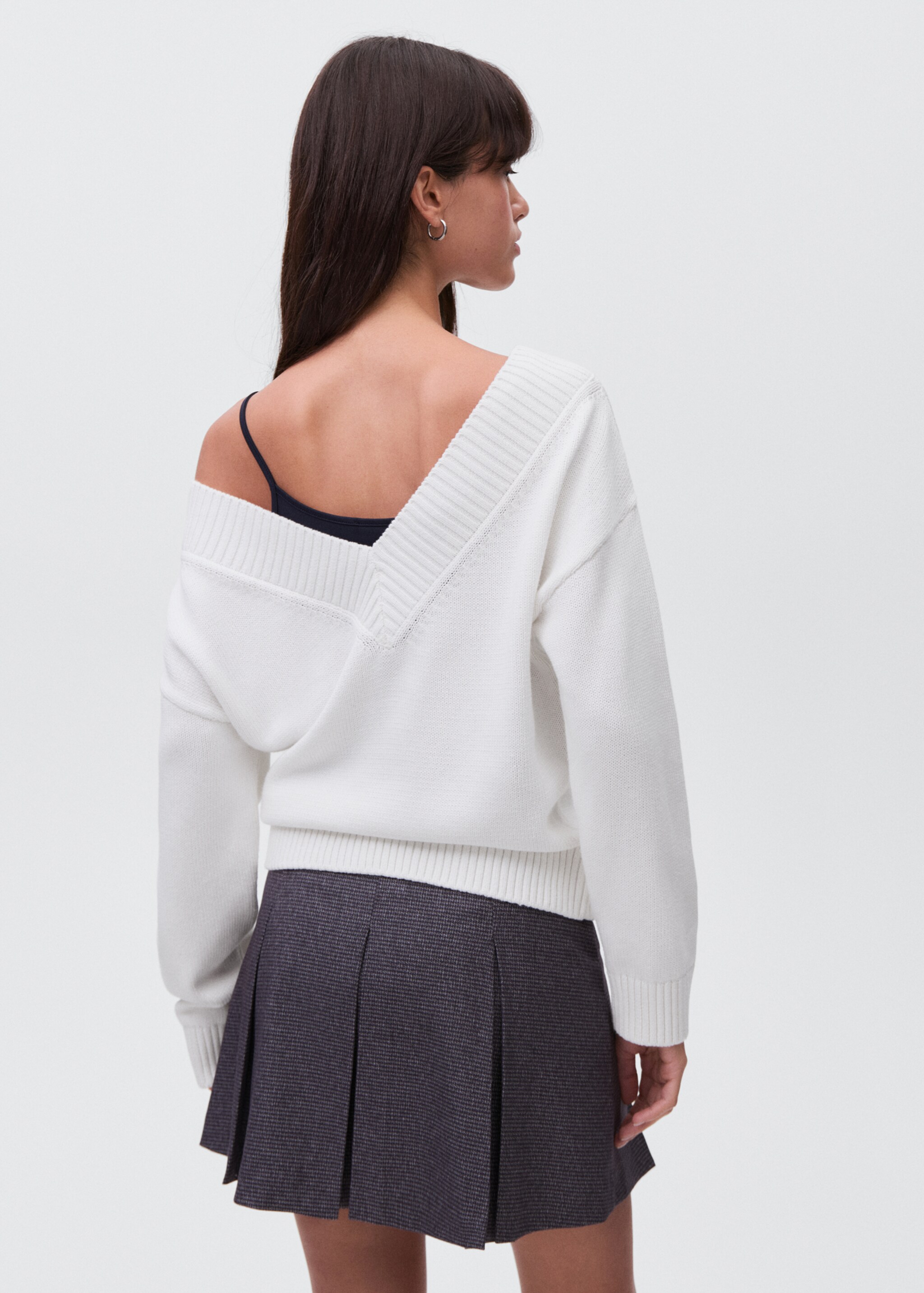 Knitted sweater with straps - Reverse of the article