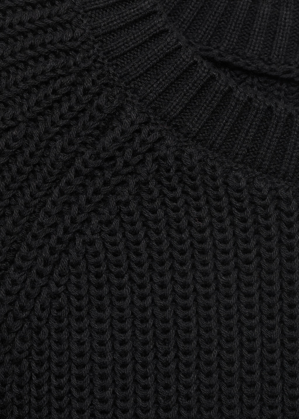 Knitted sweater with openings