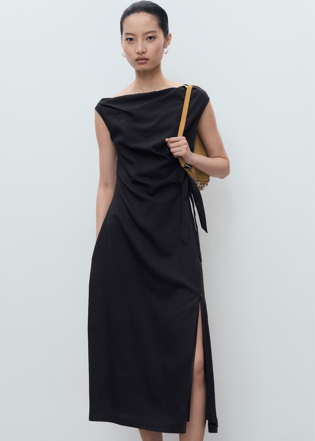 Asymmetrical knotted dress