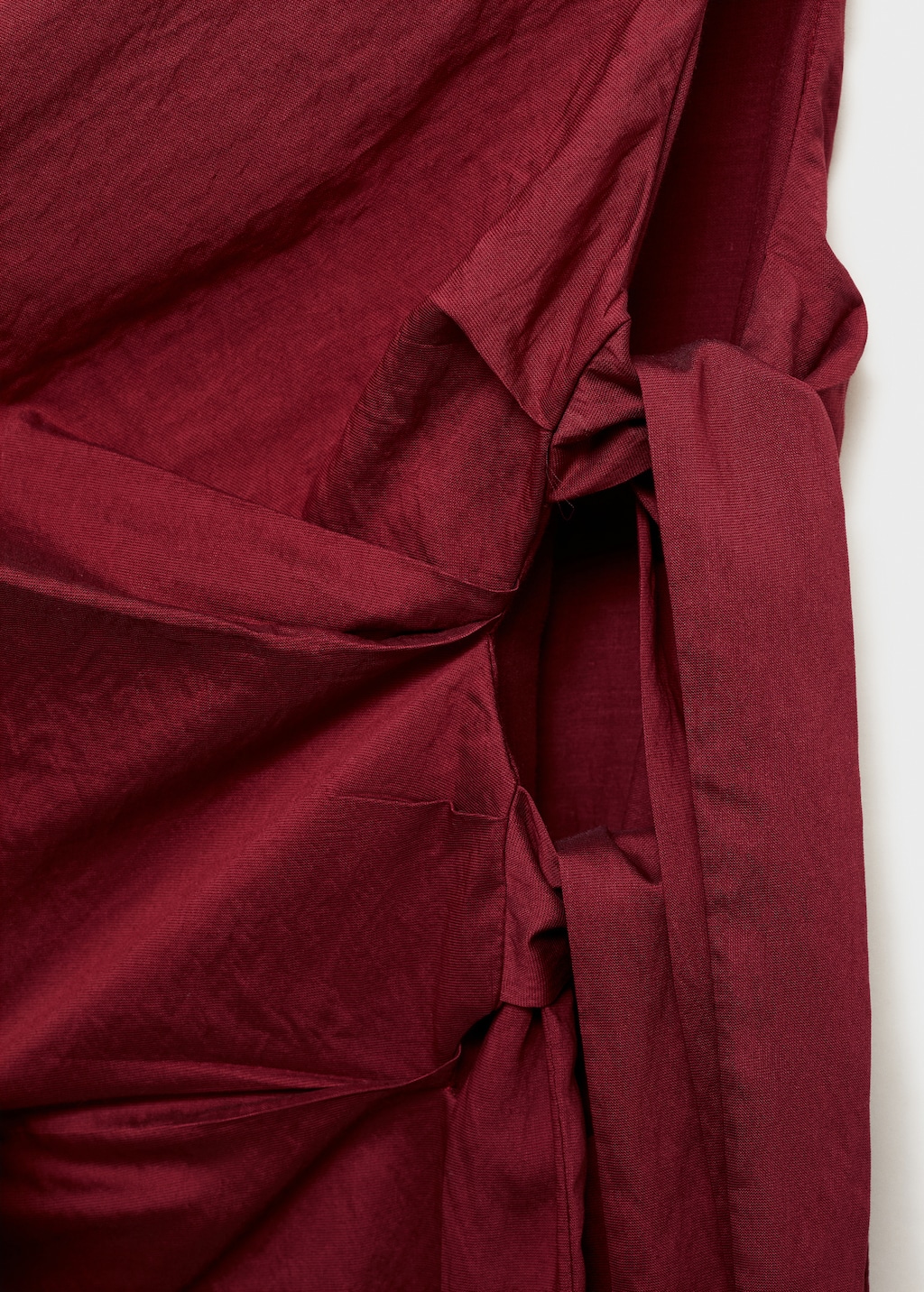 Asymmetrical knotted dress