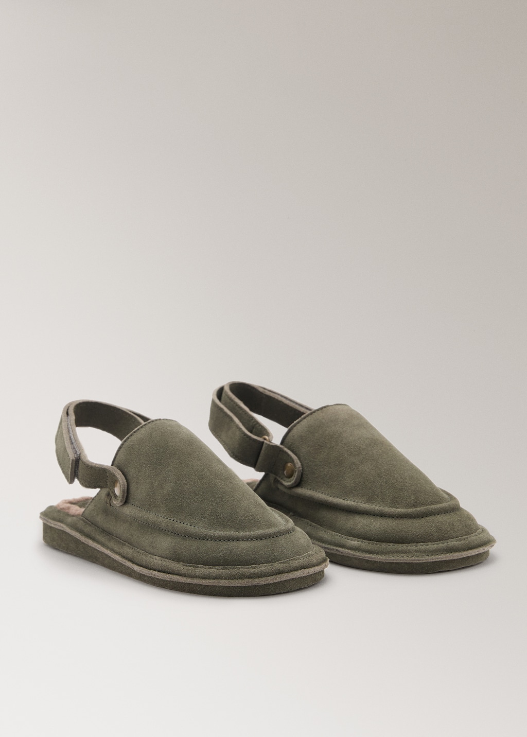 Leather slippers with shearling lining