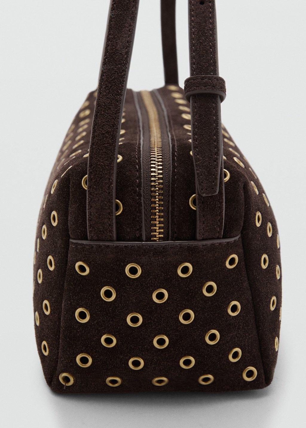 Suede shoulder bag with eyelets
