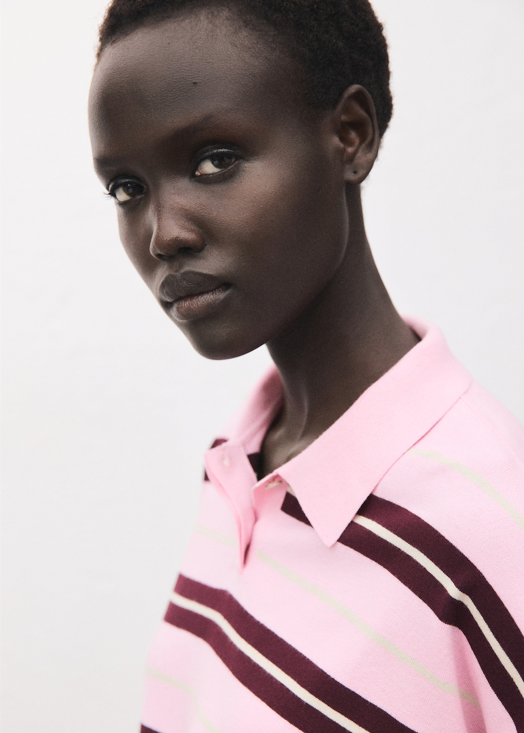 Striped polo-neck sweater