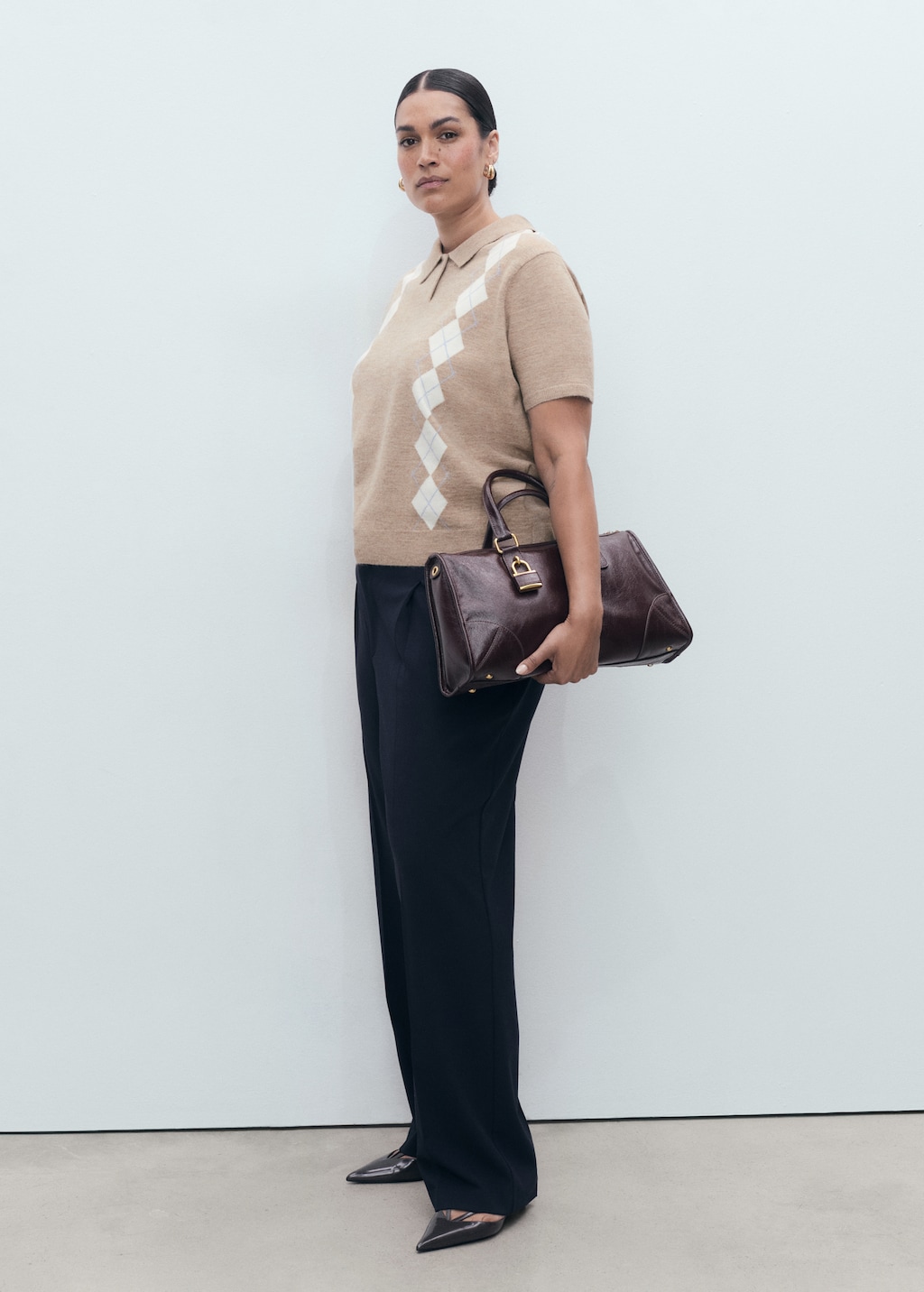 Argyle polo neck sweater