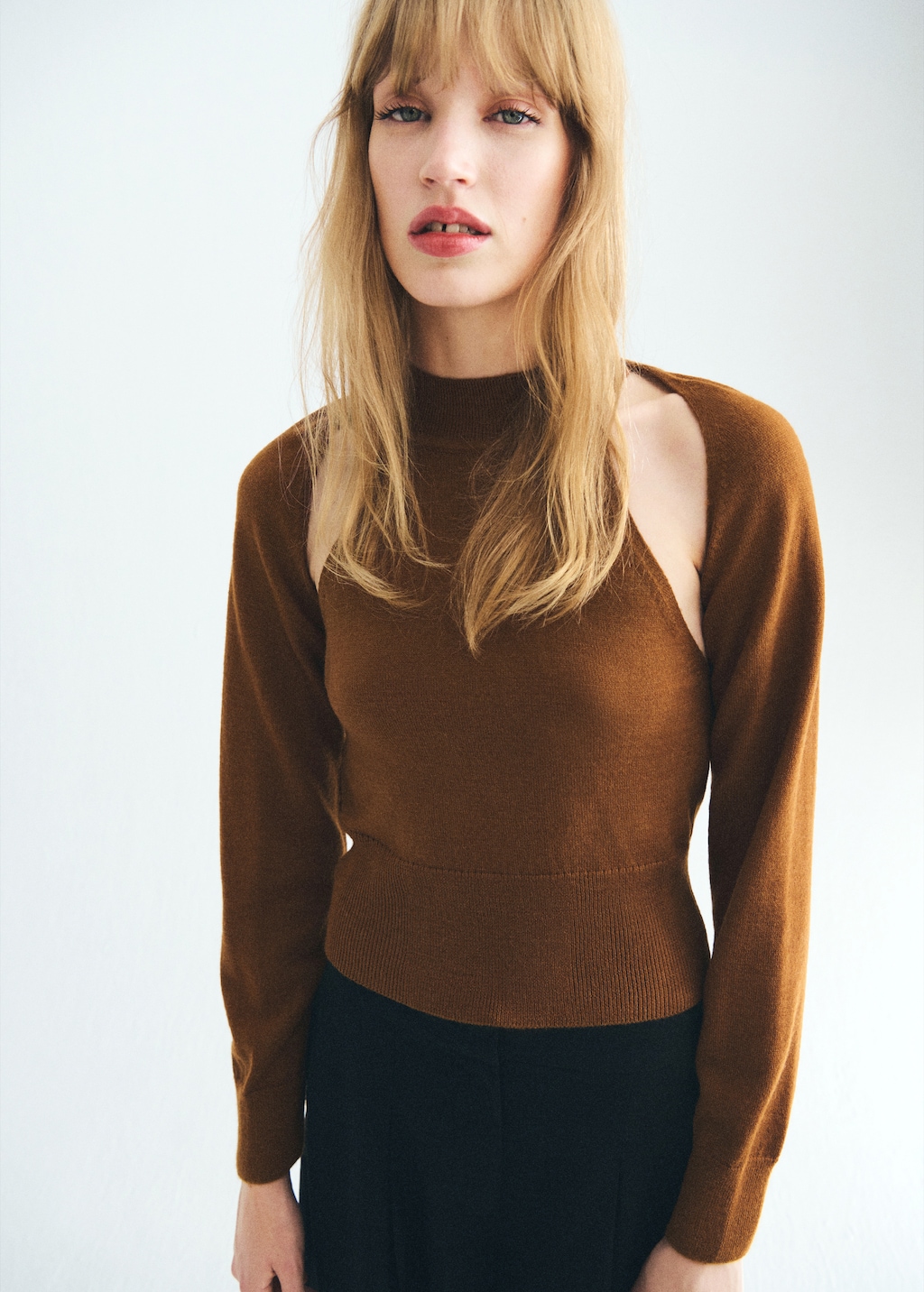 Sweater with cardigan-style detailing