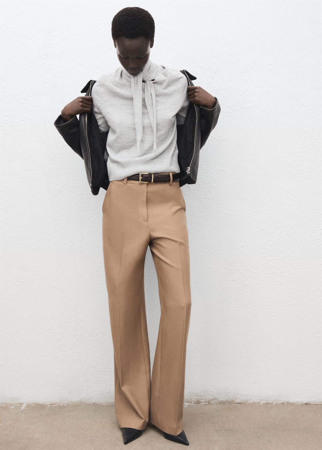 Turtleneck sweater with knot