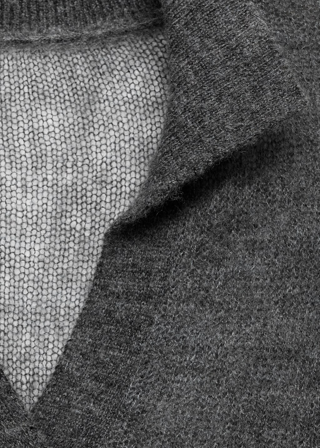 Semi-transparent polo-neck sweater