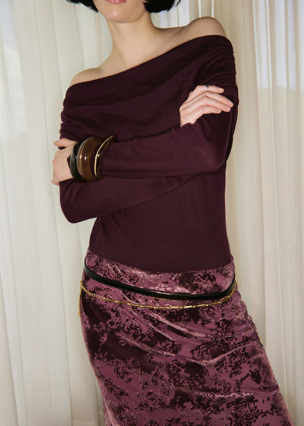 Fitted sweater with draped neckline