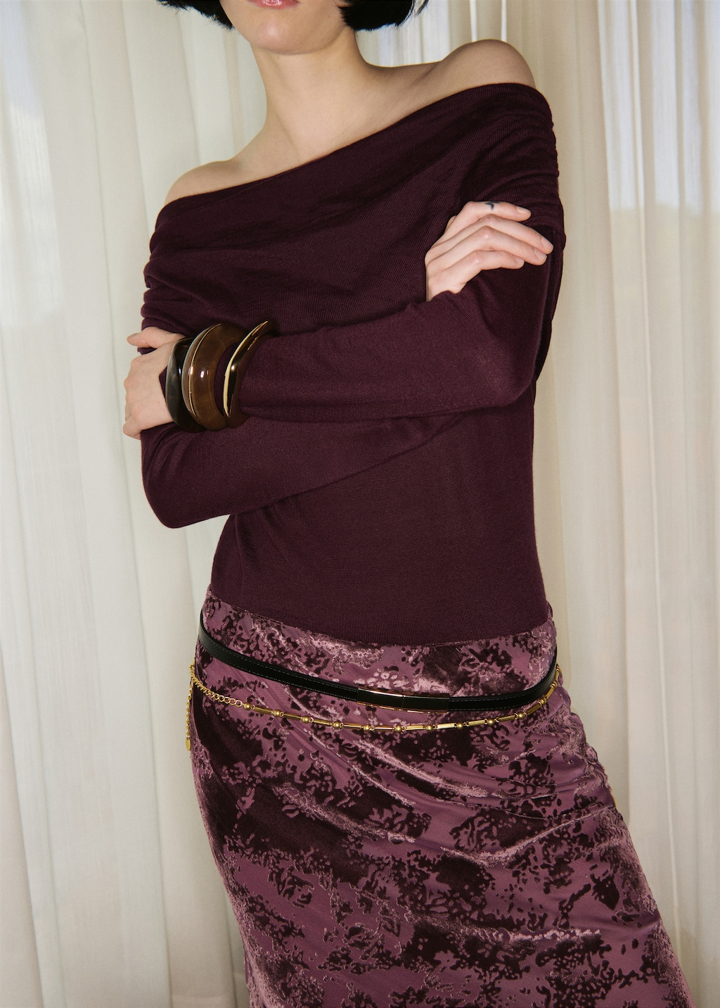 Fitted sweater with draped neckline