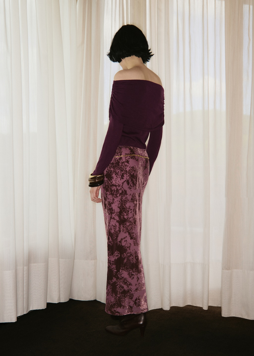 Fitted sweater with draped neckline