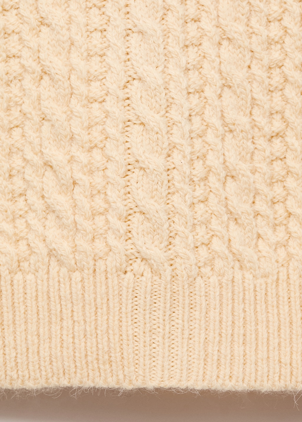 Cable-knit sweater with flared sleeves