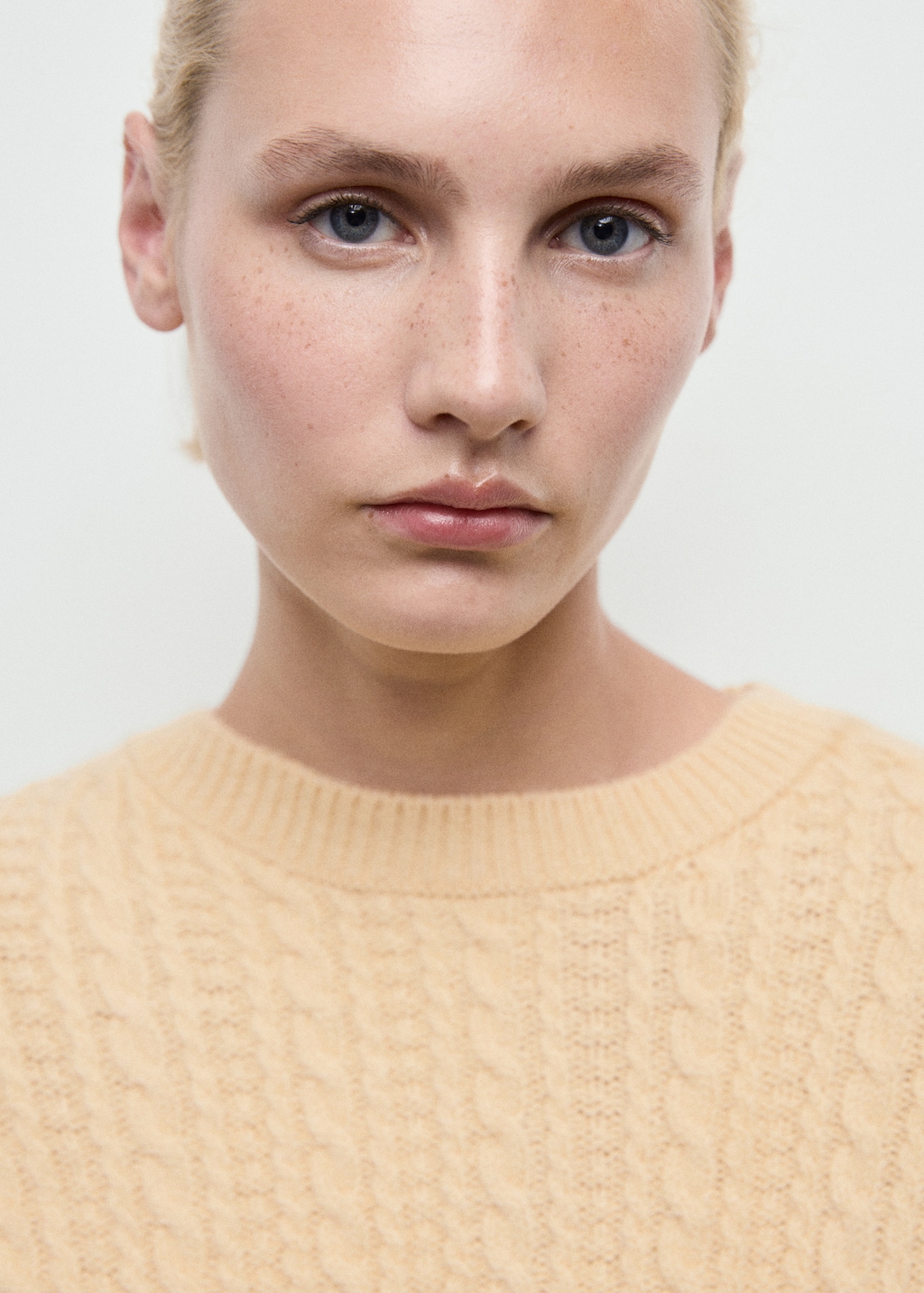 Cable-knit sweater with flared sleeves