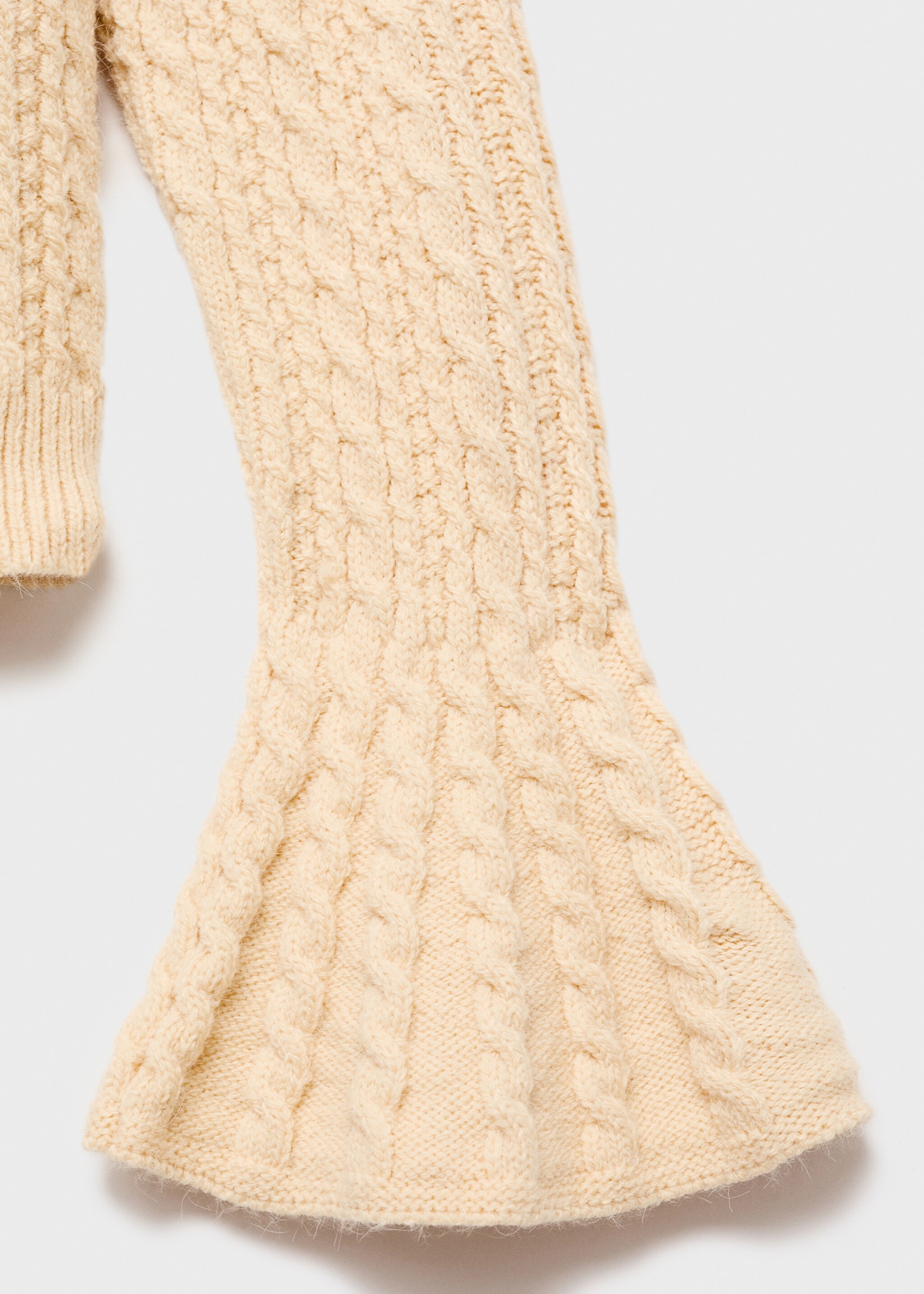 Cable-knit sweater with flared sleeves - Details of the article 8, Pastel Yellow. Ref: 17005843-00.