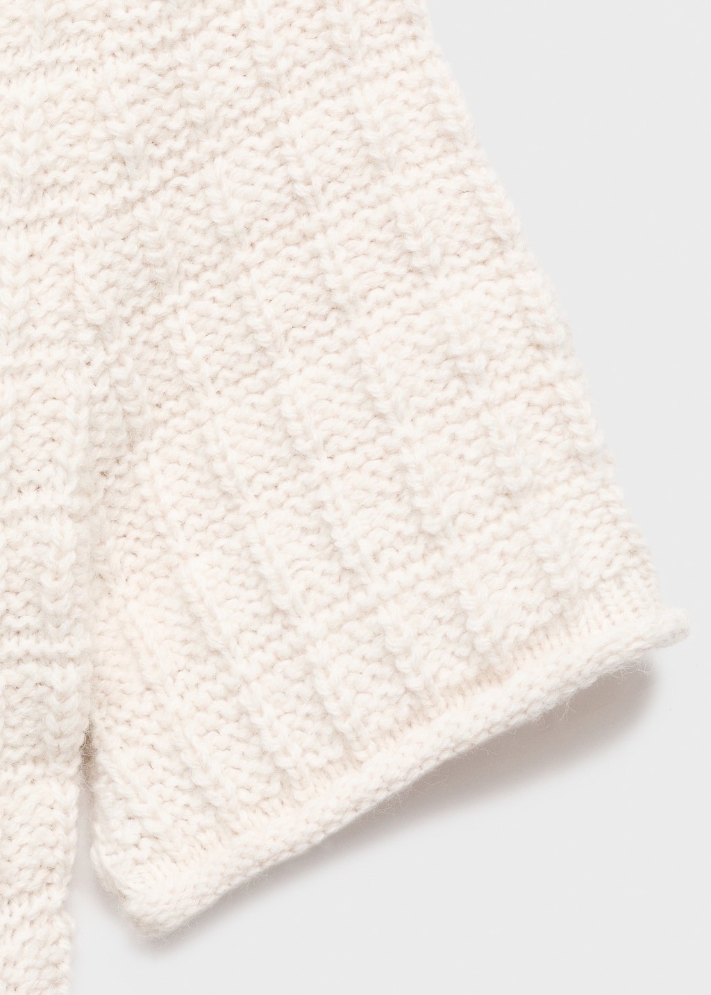 Textured sweater with ruffles