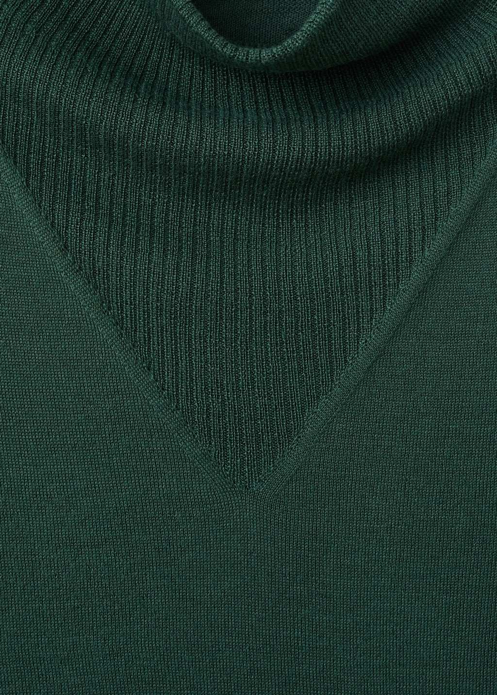 Knitted sweater with draped neck