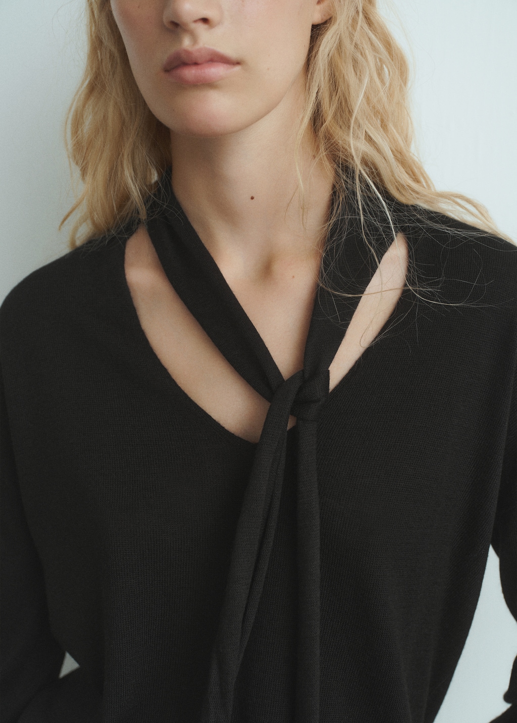 V-neck sweater with scarf