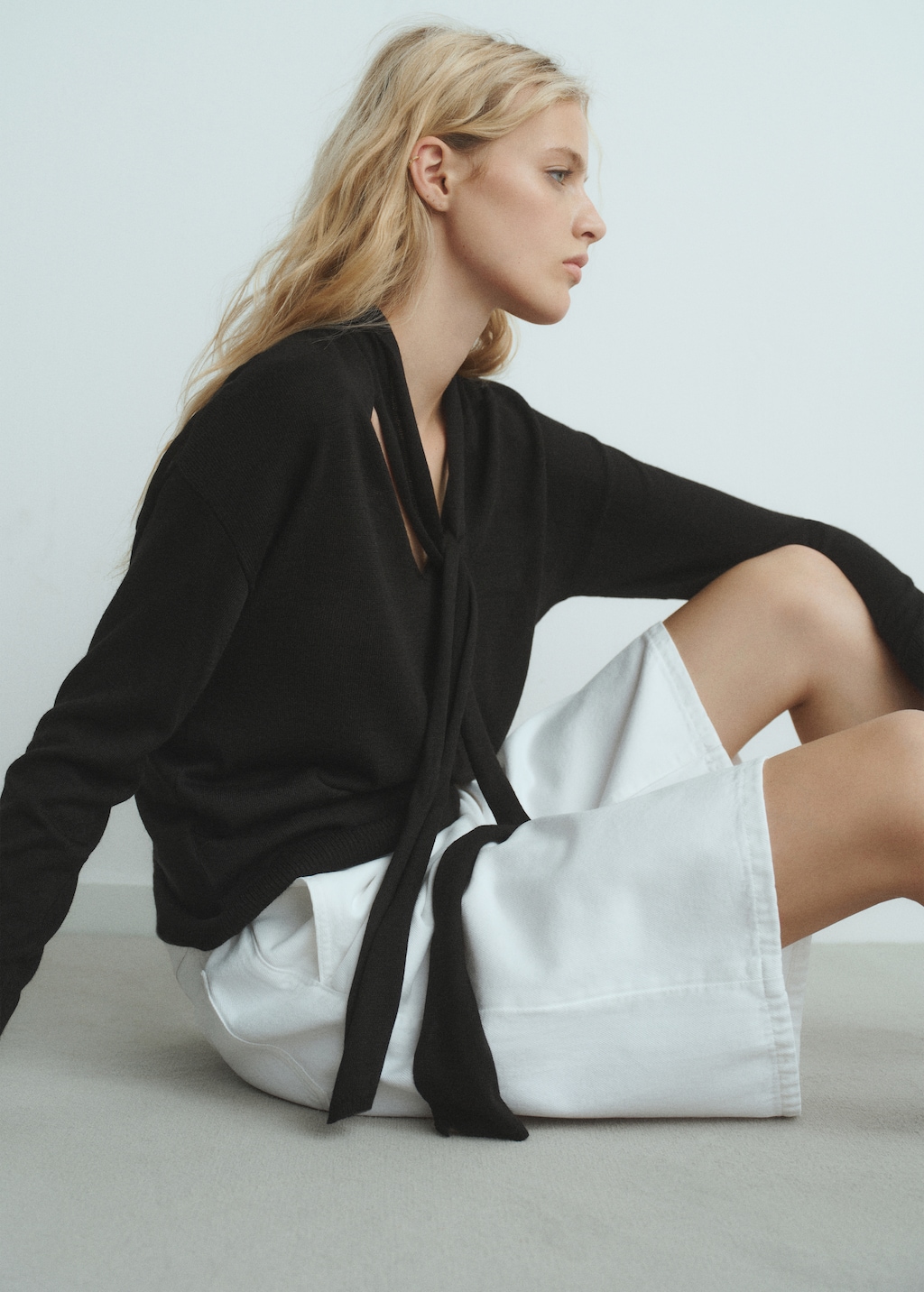 V-neck sweater with scarf