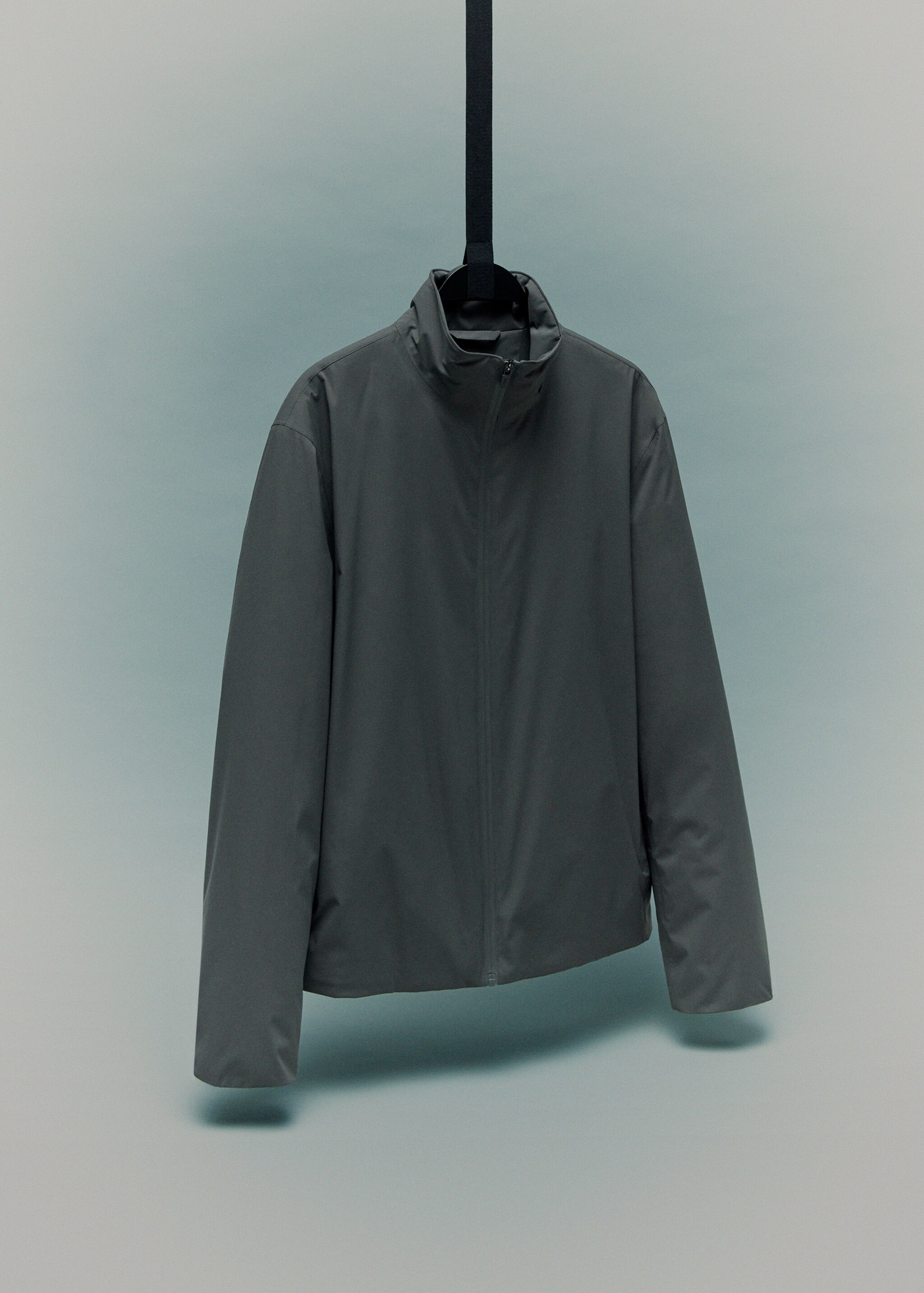 Waterproof jacket with Thermolite® padding - Details of the article 9, Dark Green. Ref: 17005970-00.