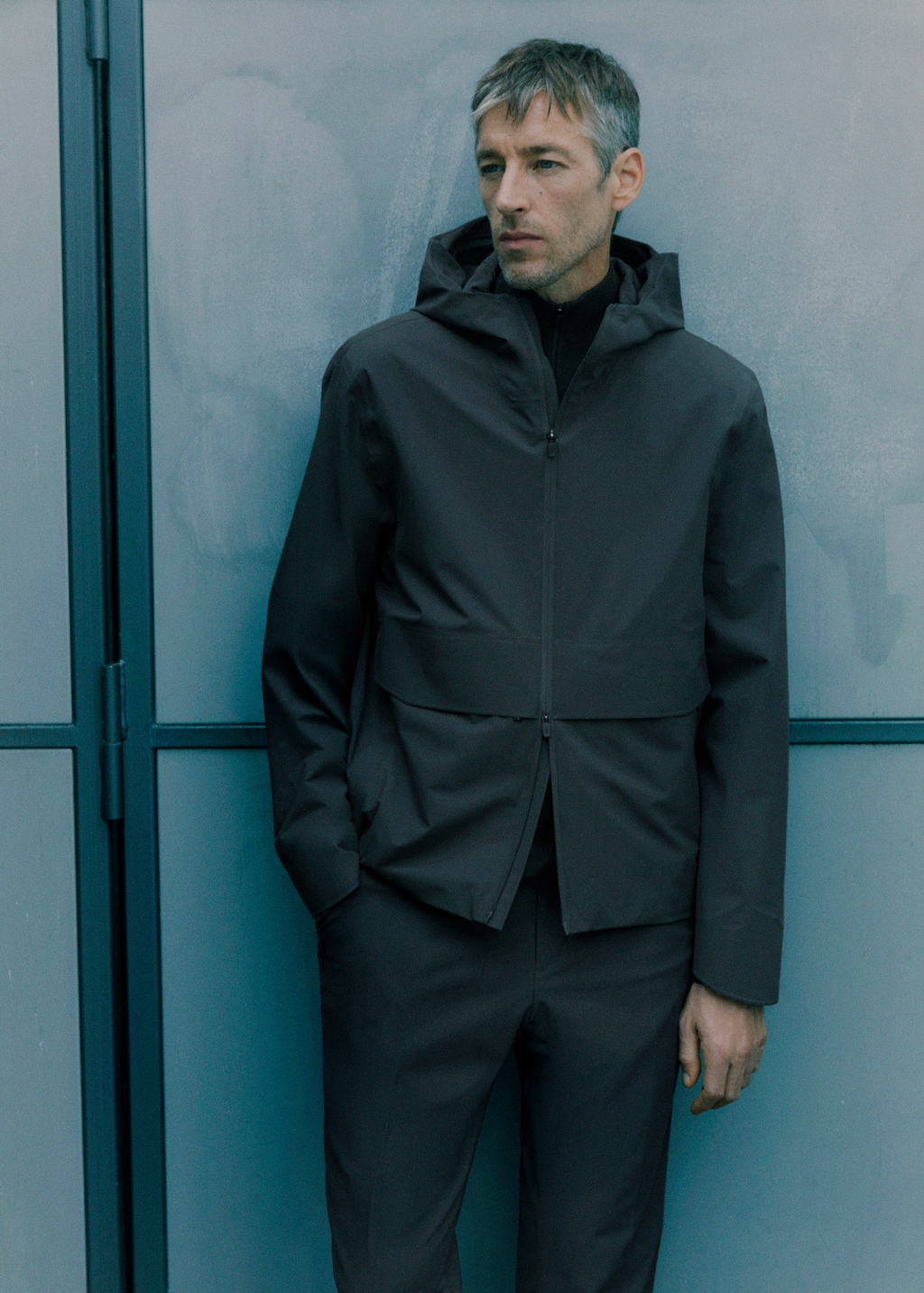 Water-repellent hooded jacket