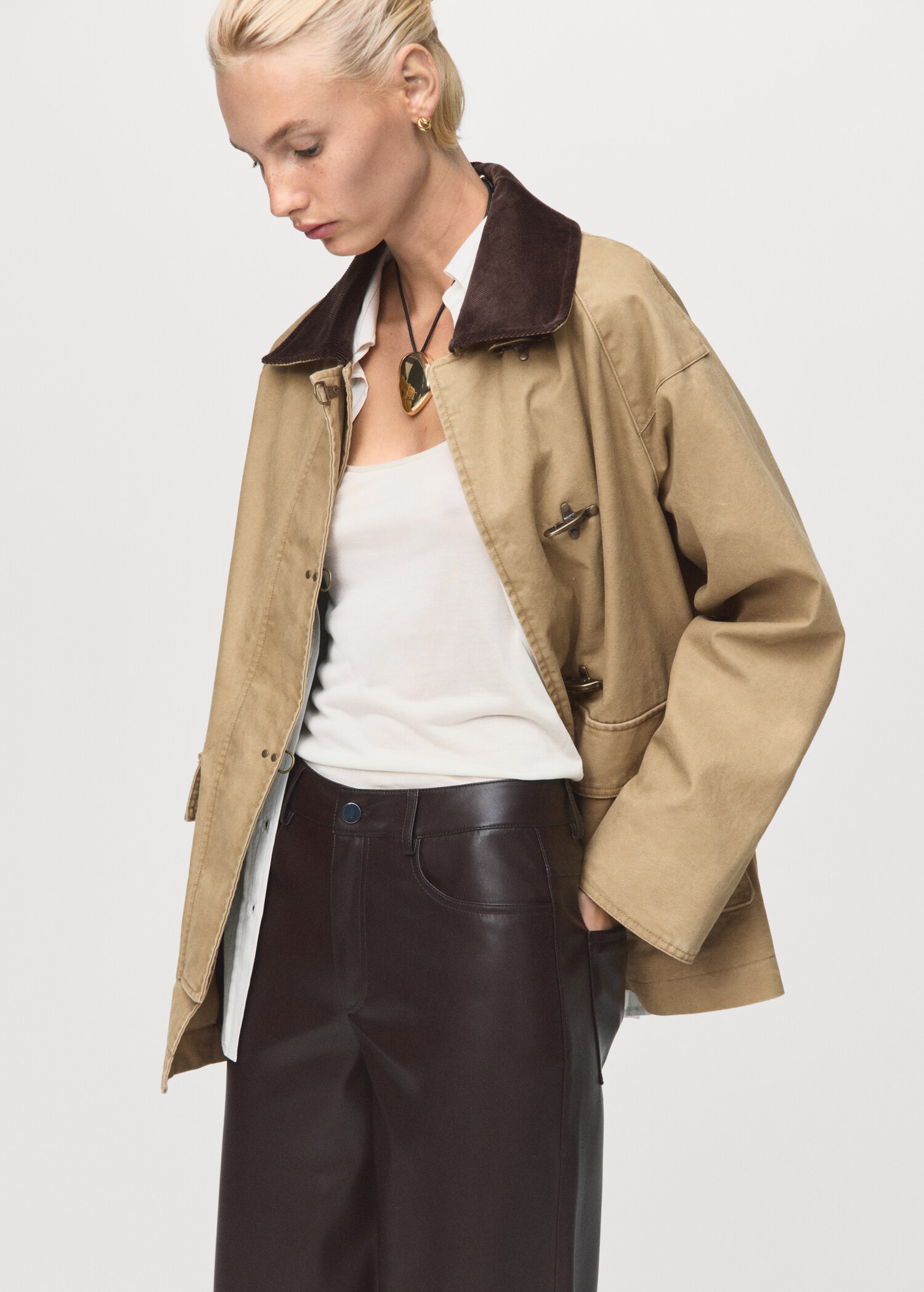 Leather-effect straight trousers - Details of the article 1