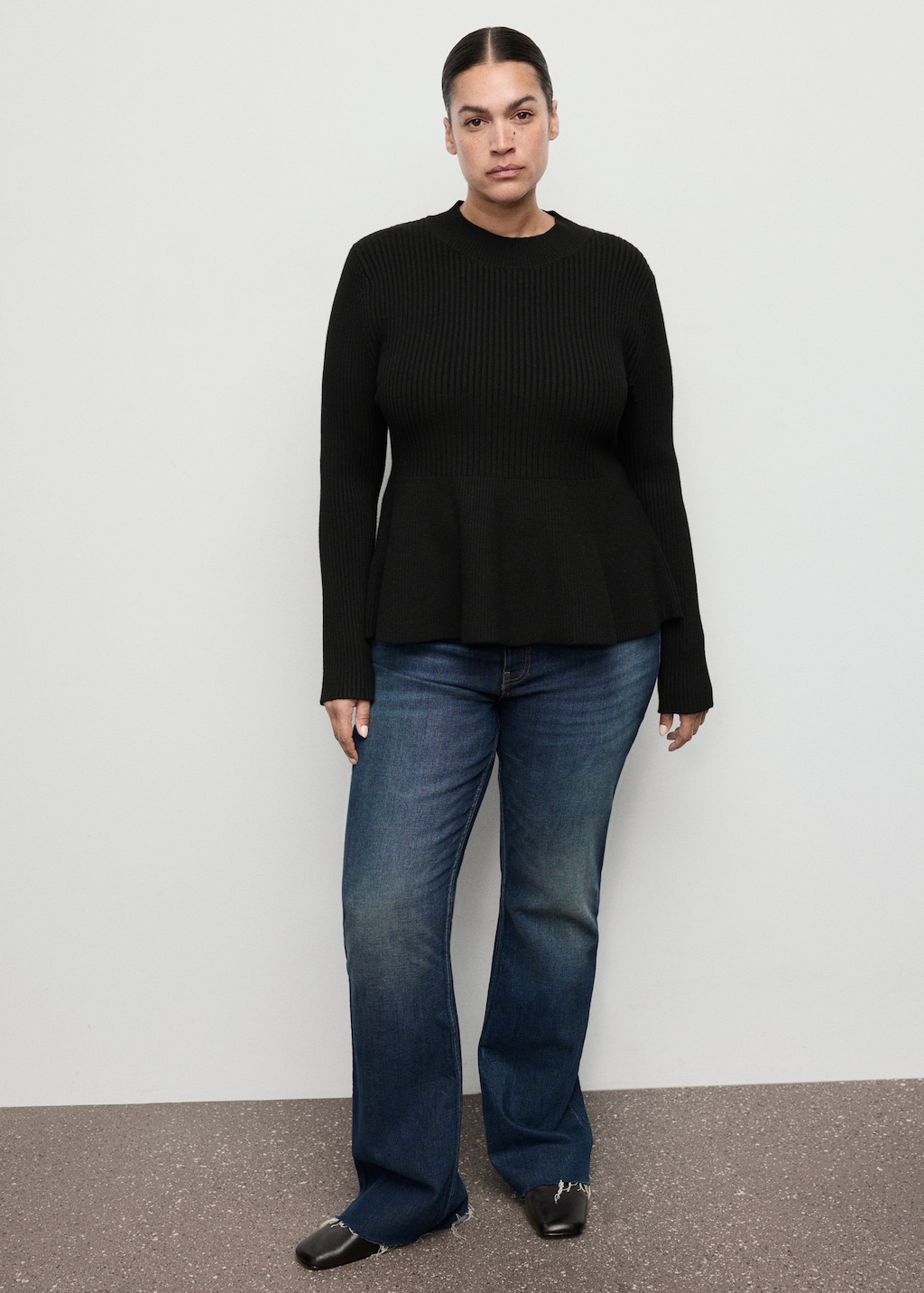 Ribbed peplum sweater