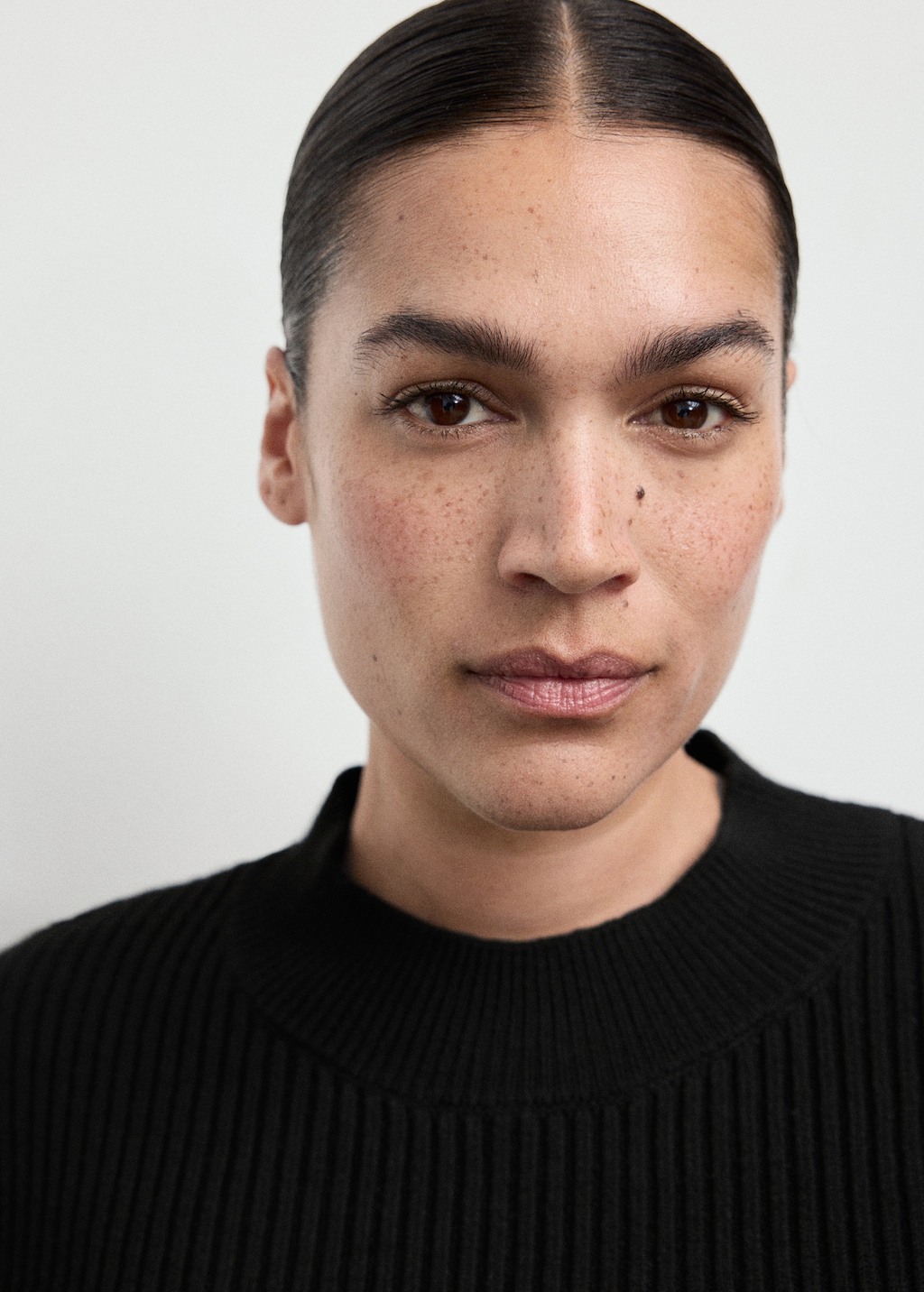 Ribbed peplum sweater