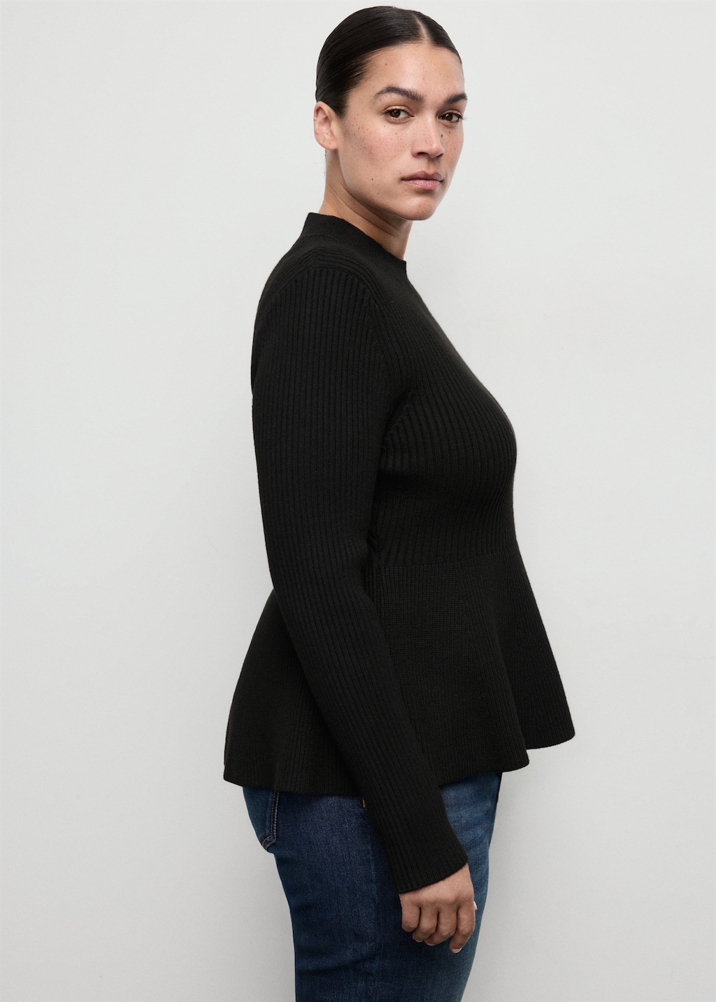 Ribbed peplum sweater