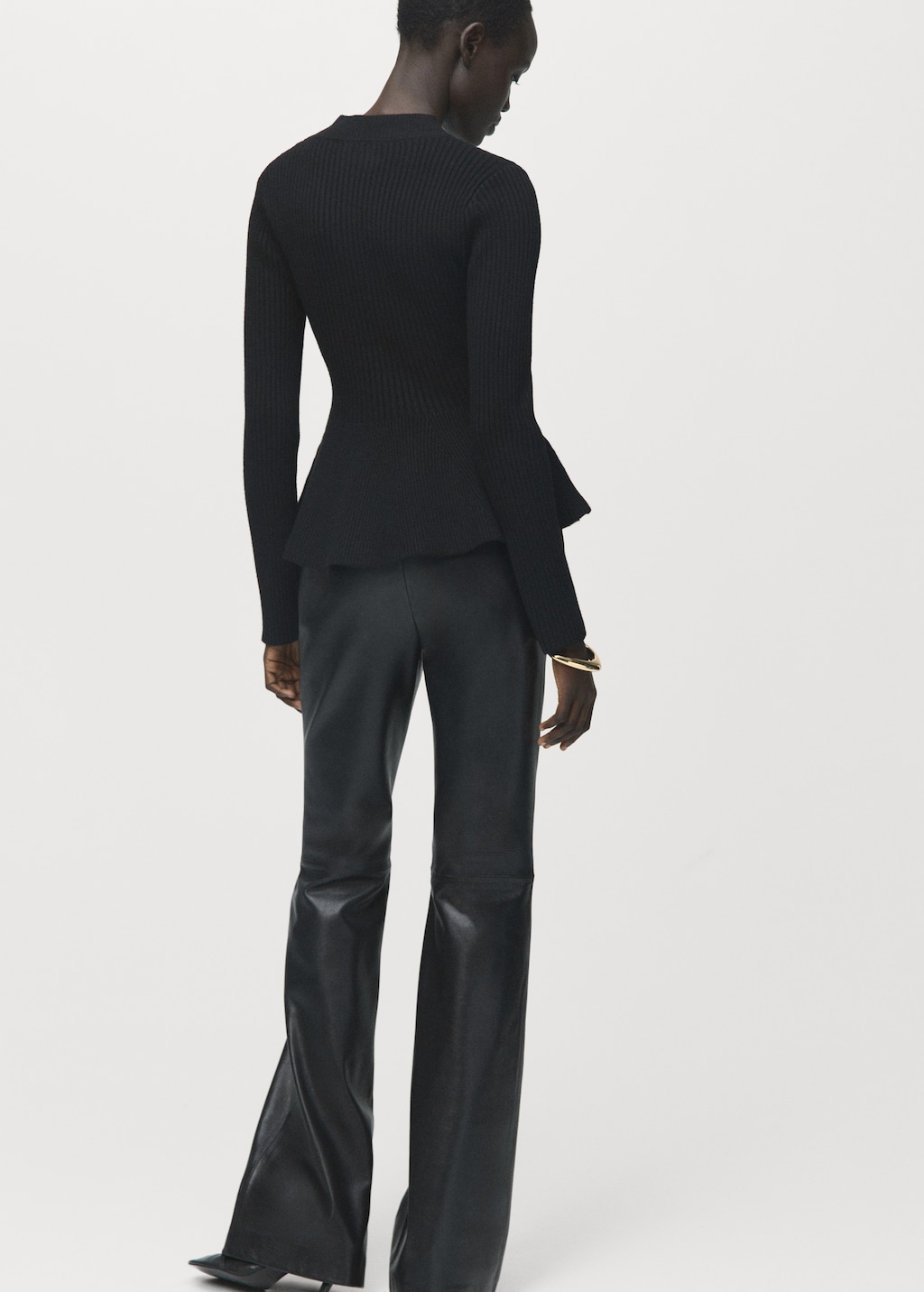 Ribbed peplum sweater