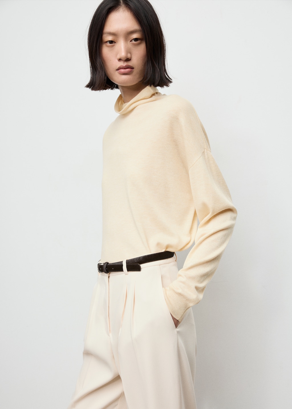 Cable-knit turtleneck sweater