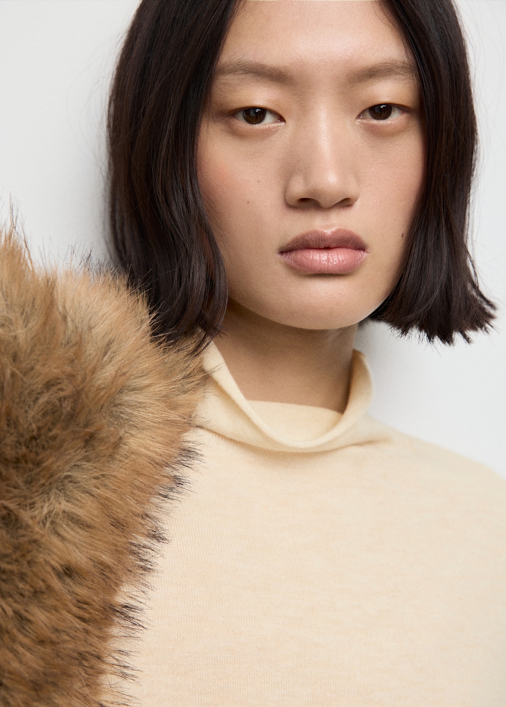 Cable-knit turtleneck sweater