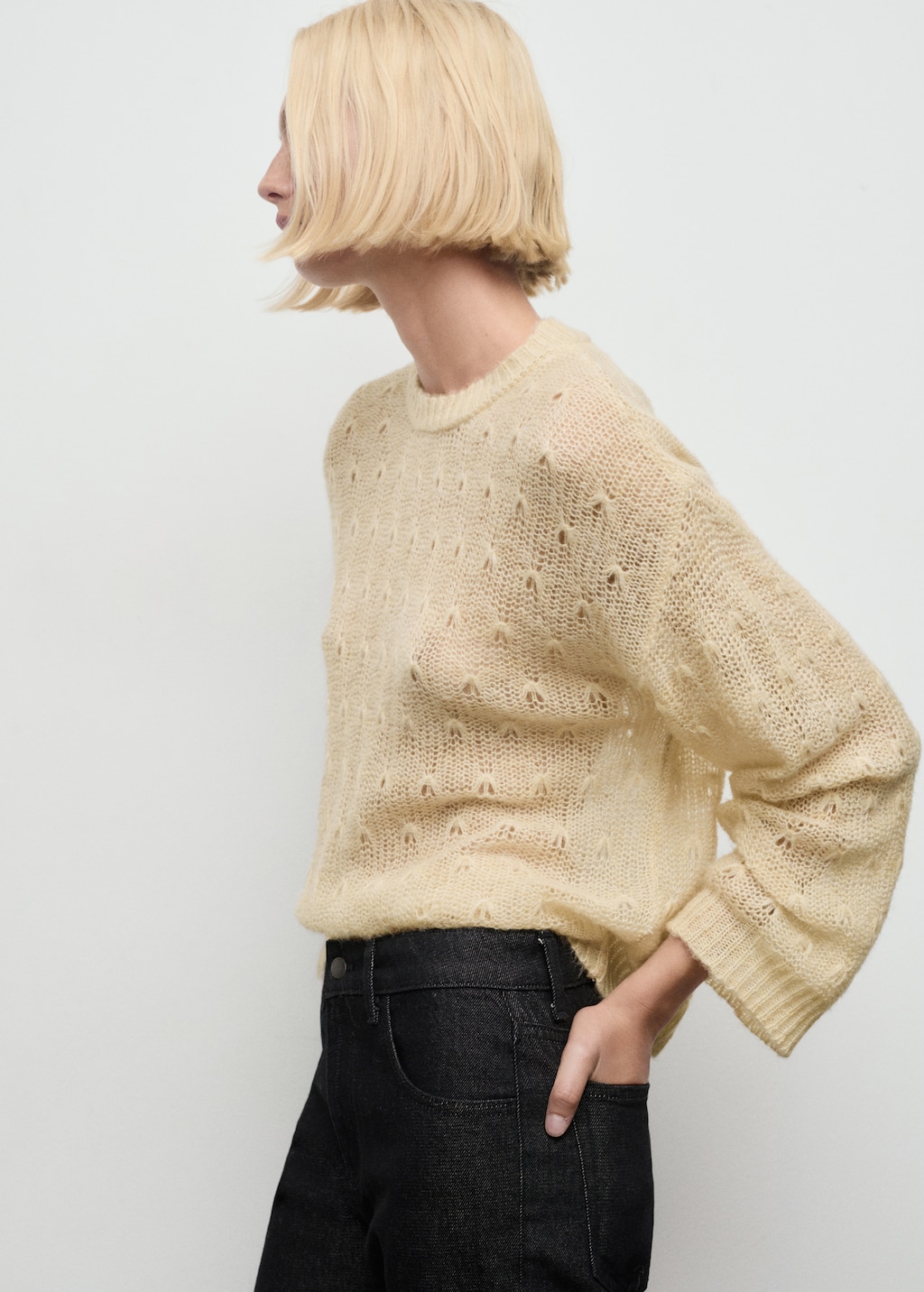 Knit sweater with lace pattern