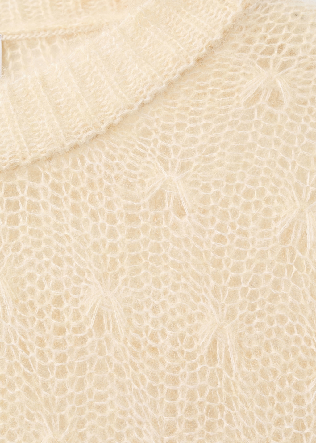 Knit sweater with lace pattern