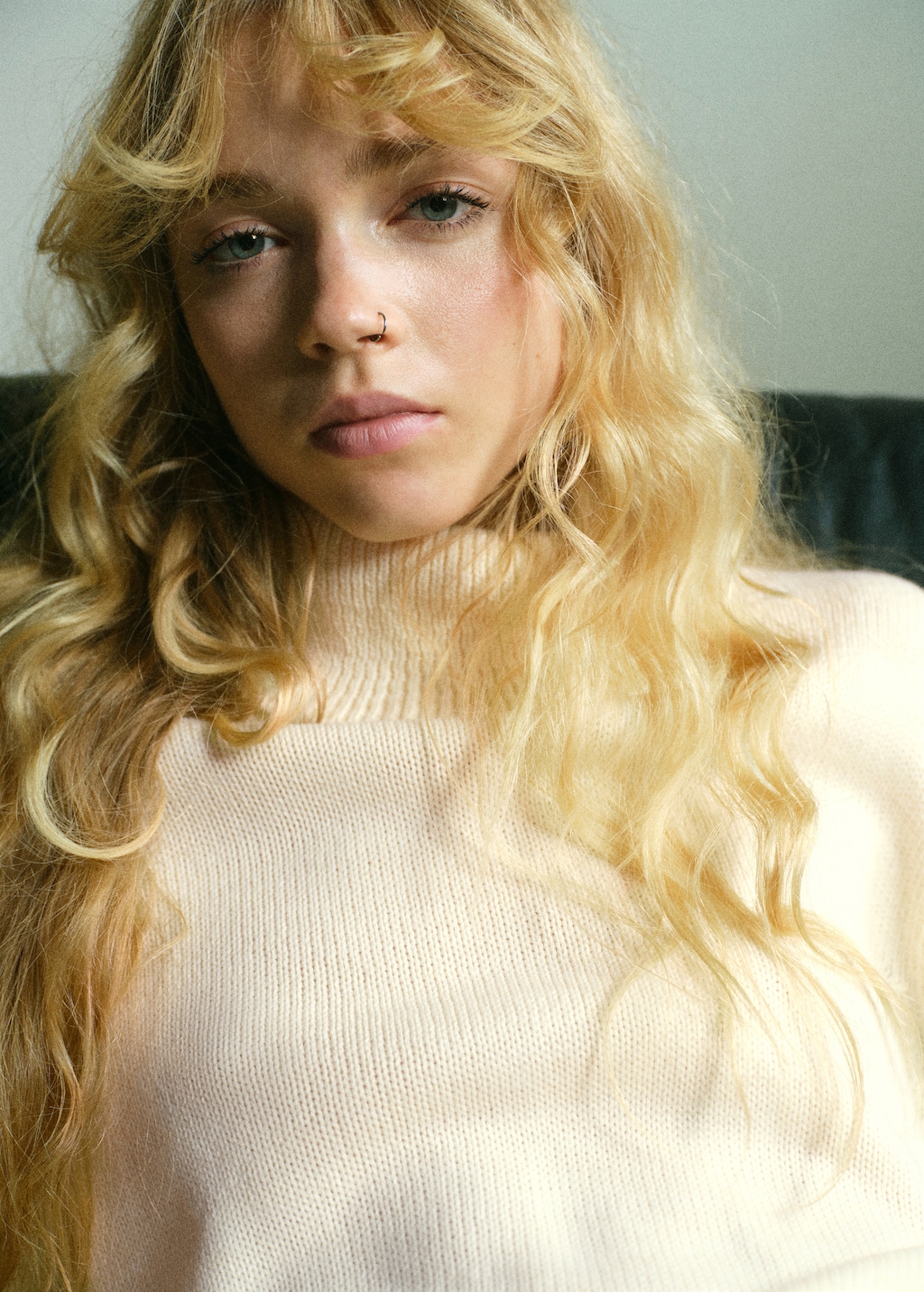 Turtleneck sweater with slits