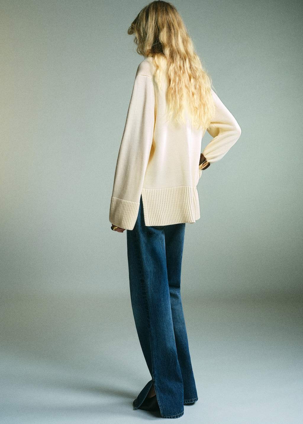 Turtleneck sweater with slits