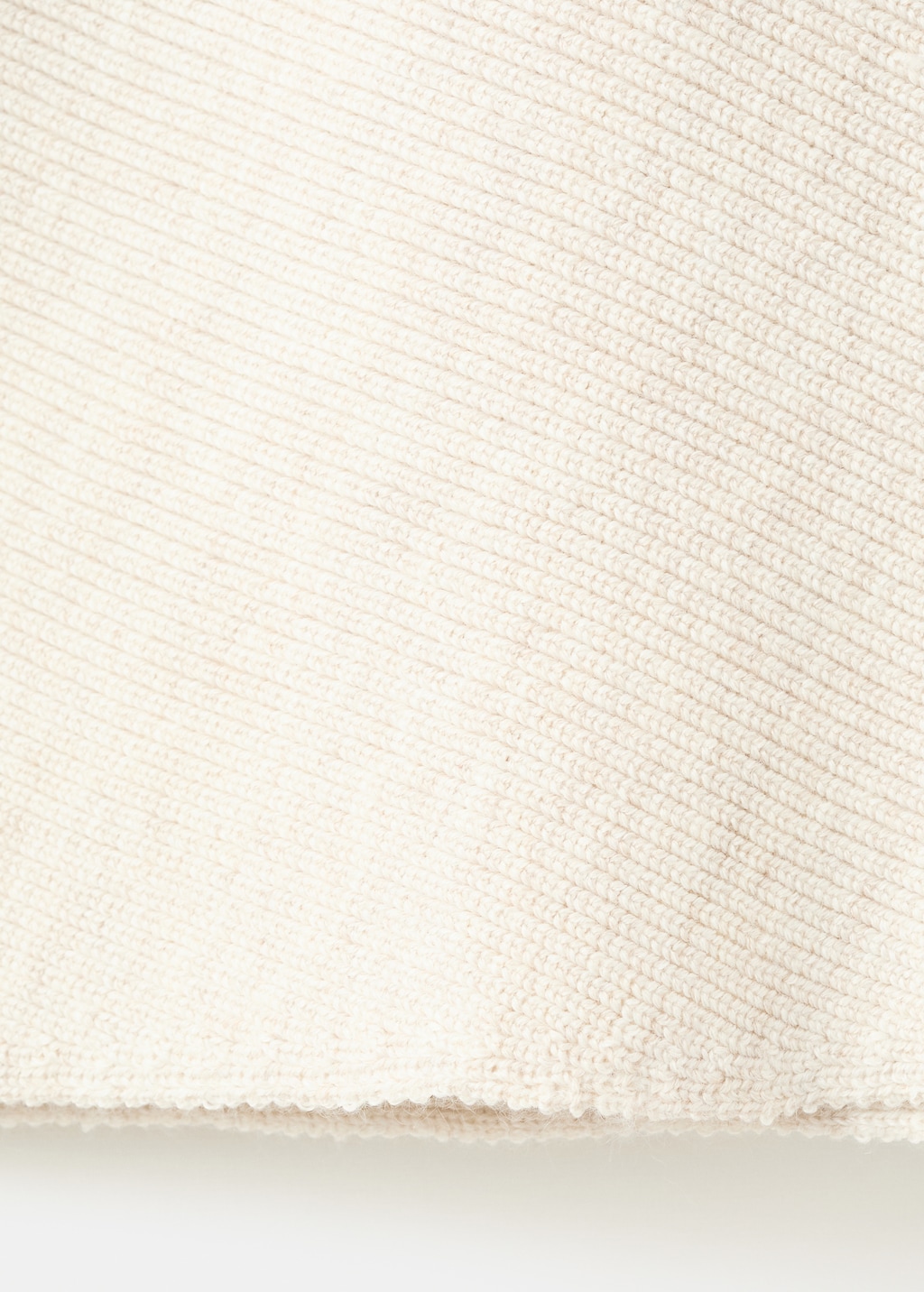 Sweater with asymmetrical neck and jewel buttons