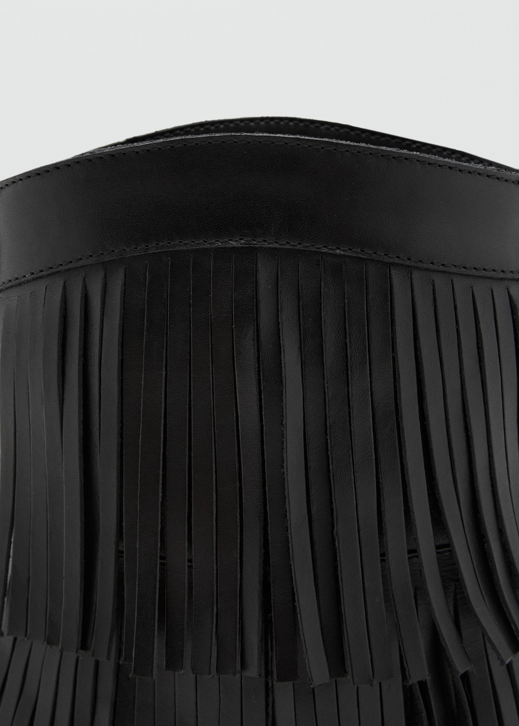 Leather ankle boot with fringe heel