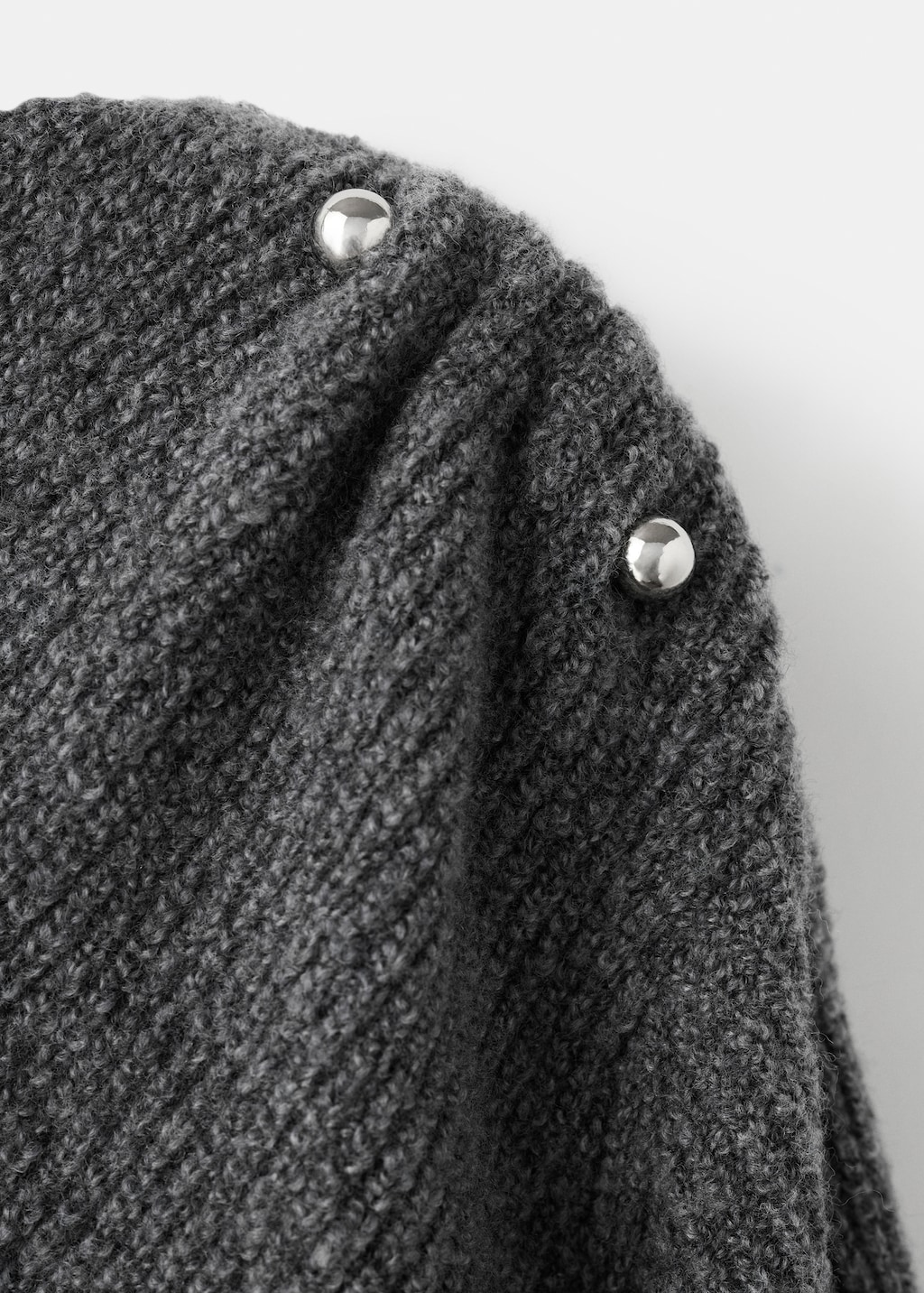 Asymmetrical sweater with metallic detail