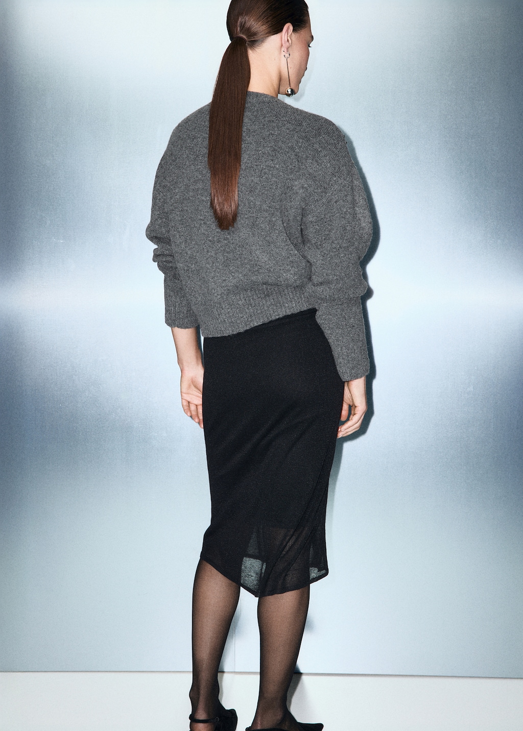 Knitted sweater with sequins