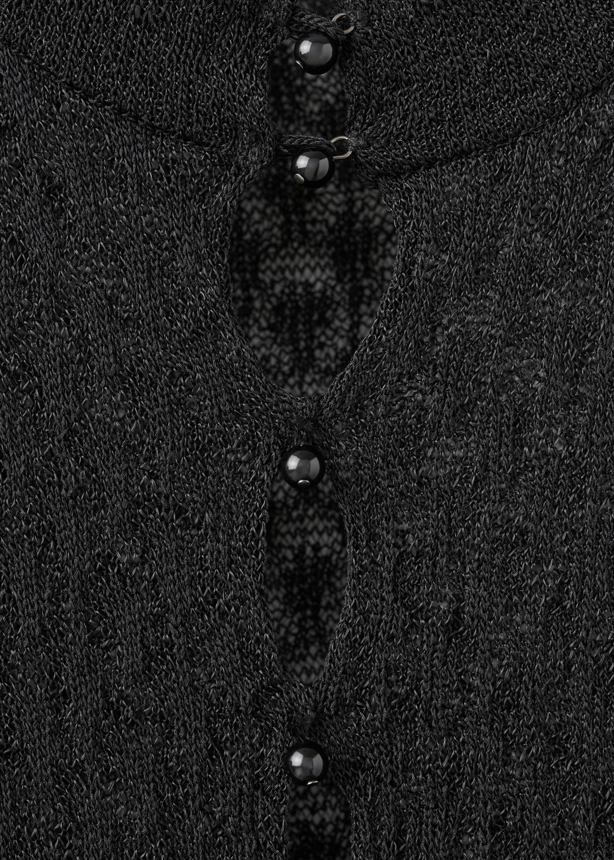 Lochstrick-Jersey mit Perlenverschluss - Detail des Artikels 0, Schwarz. Ref: 17009133-00.