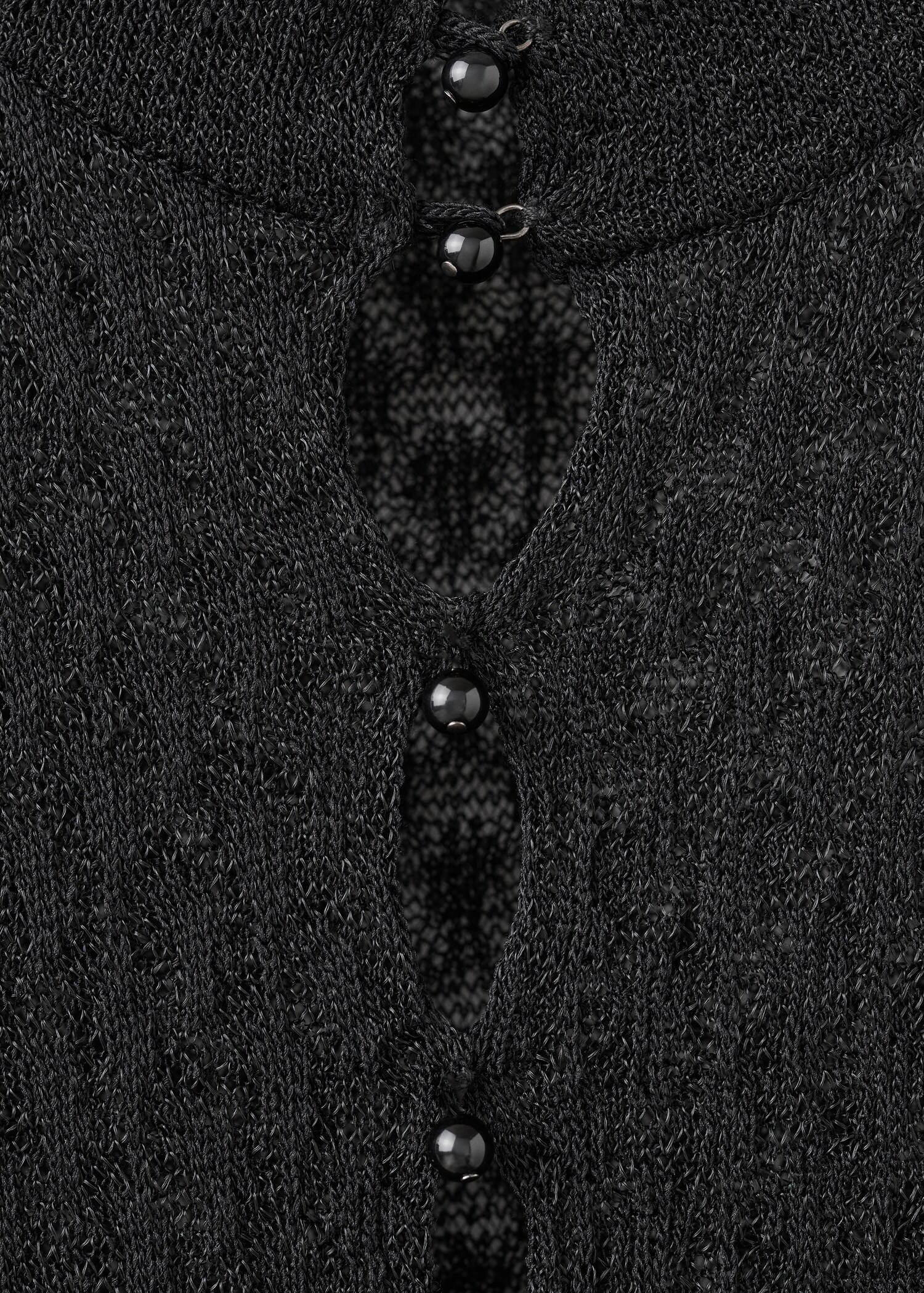 Lochstrick-Jersey mit Perlenverschluss - Detail des Artikels 0