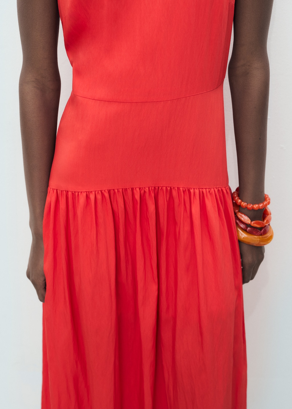 Long dress with gathered hem