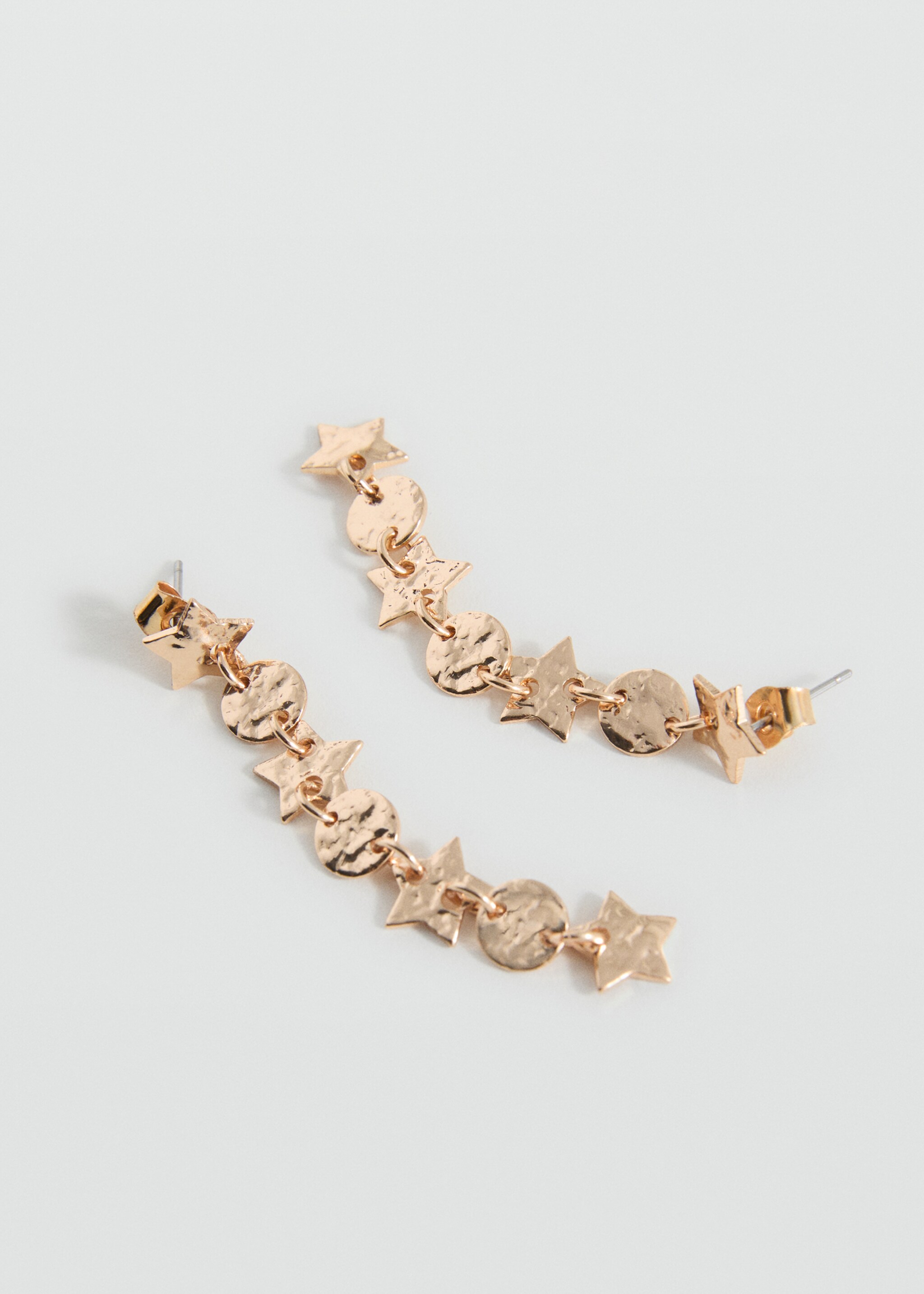 Boucles d'oreilles pendantes étoiles - Plan moyen